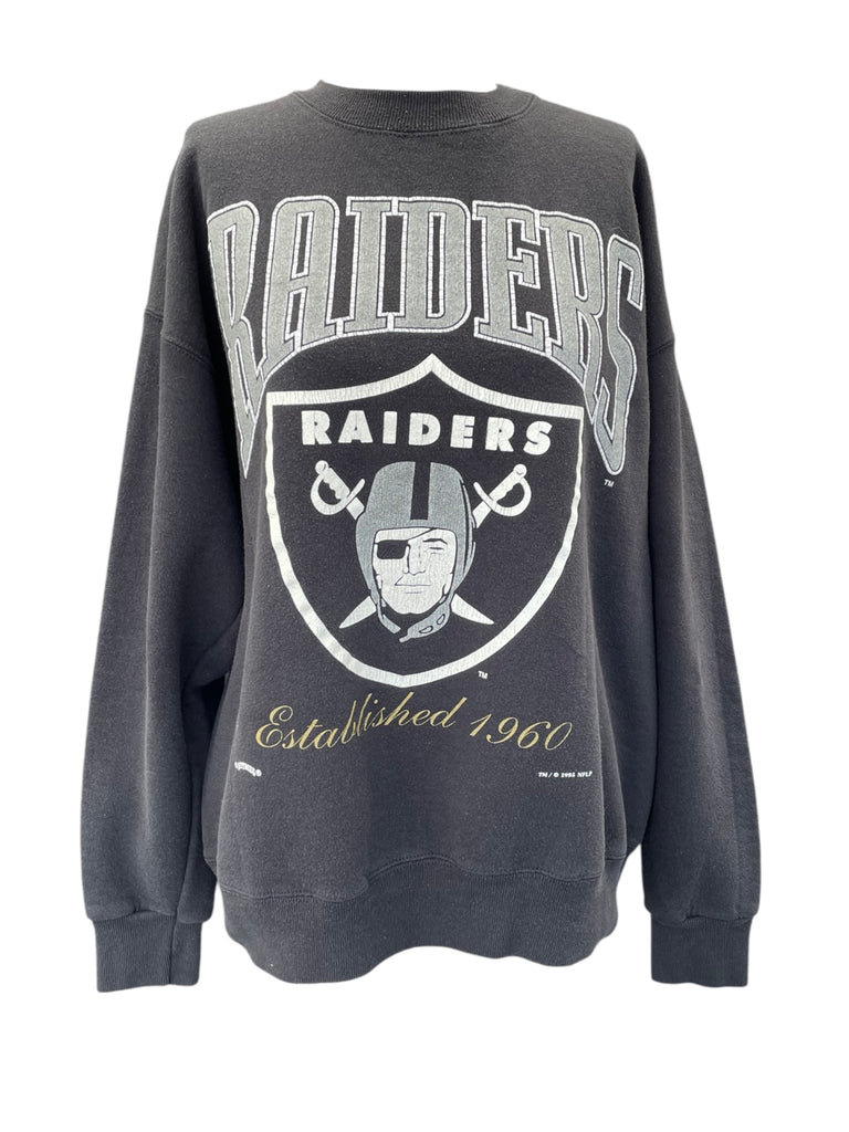 Dark gray sweatshirt with 'Raiders' logo and text on a white background