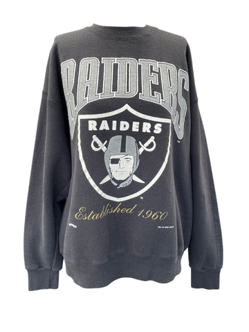 Dark gray sweatshirt with 'Raiders' logo and text on a white background