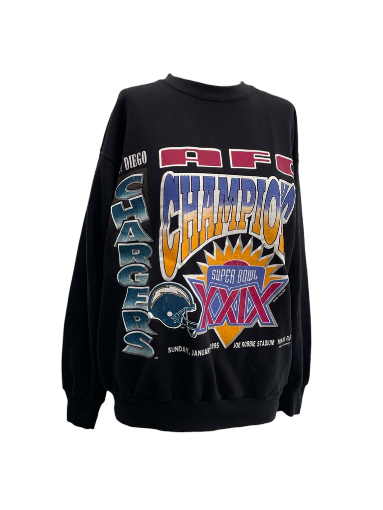 Black sweatshirt with colorful text and graphics on a white background