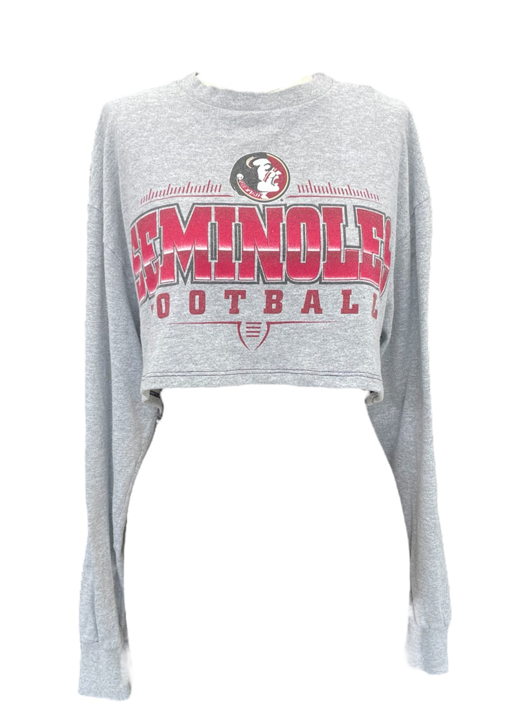 Gray long-sleeve crop top with 'Seminoles Football' text and logo on a white background