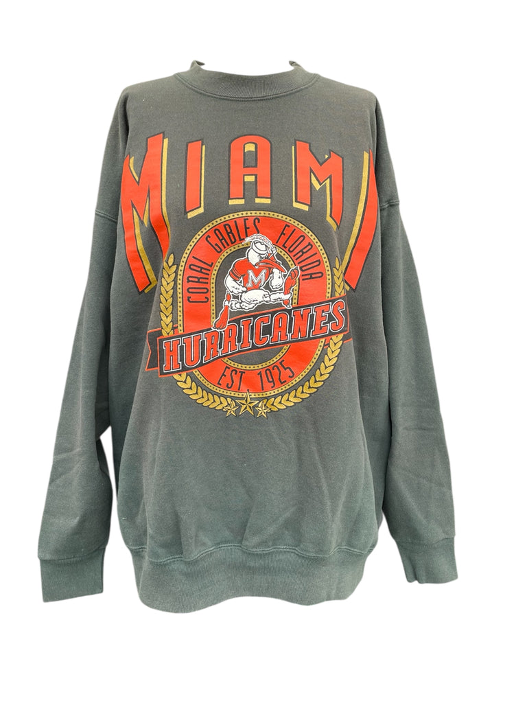 green sweatshirt with 'Miami Hurricanes' logo on a white background