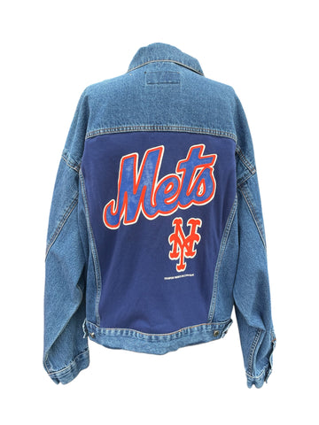 Blue denim jacket with 'Mets' logo on the back against a white background