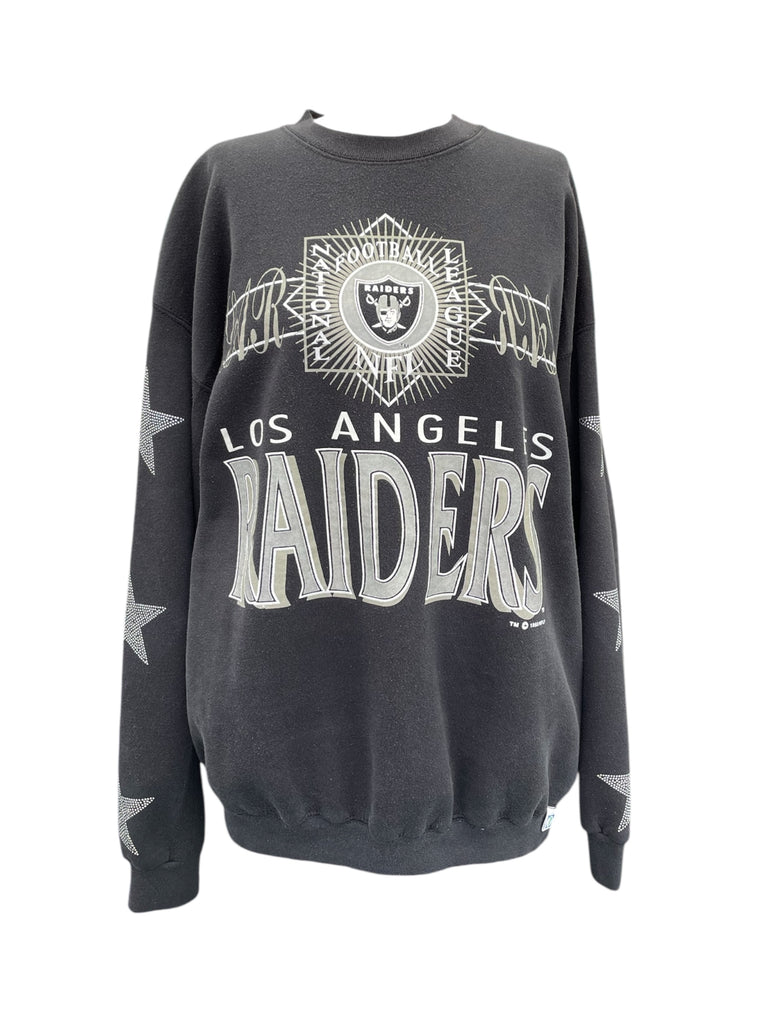 Gray sweatshirt with 'Los Angeles Raiders' text and logo on a white background