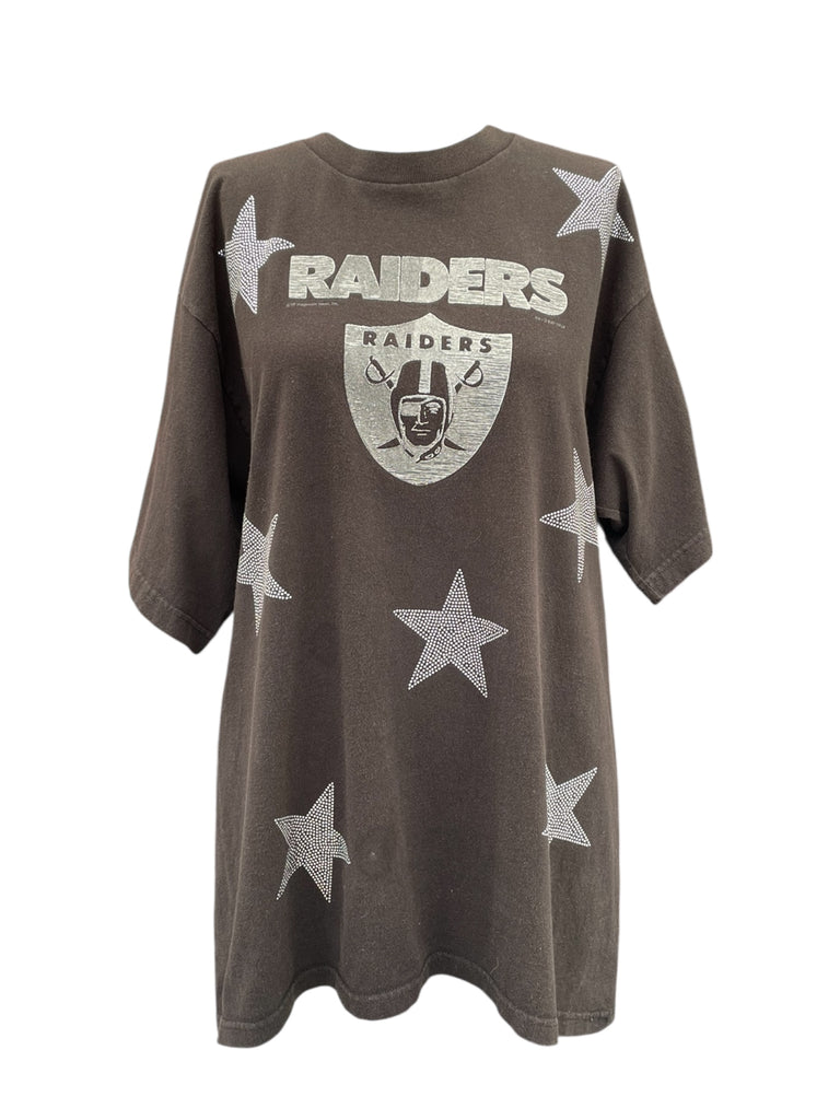 Brown t-shirt with 'RAIDERS' logo and star patterns on a white background