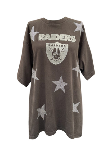 Brown t-shirt with 'RAIDERS' logo and star patterns on a white background