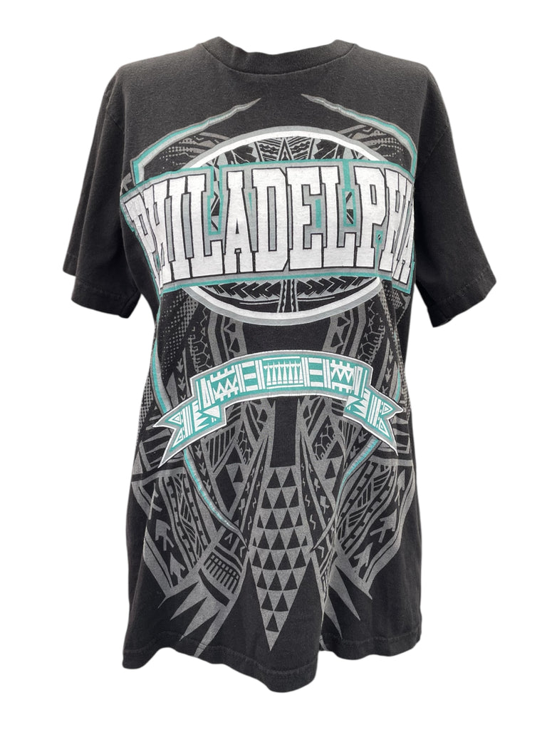 Black t-shirt with 'Philadelphia' and tribal design on a white background