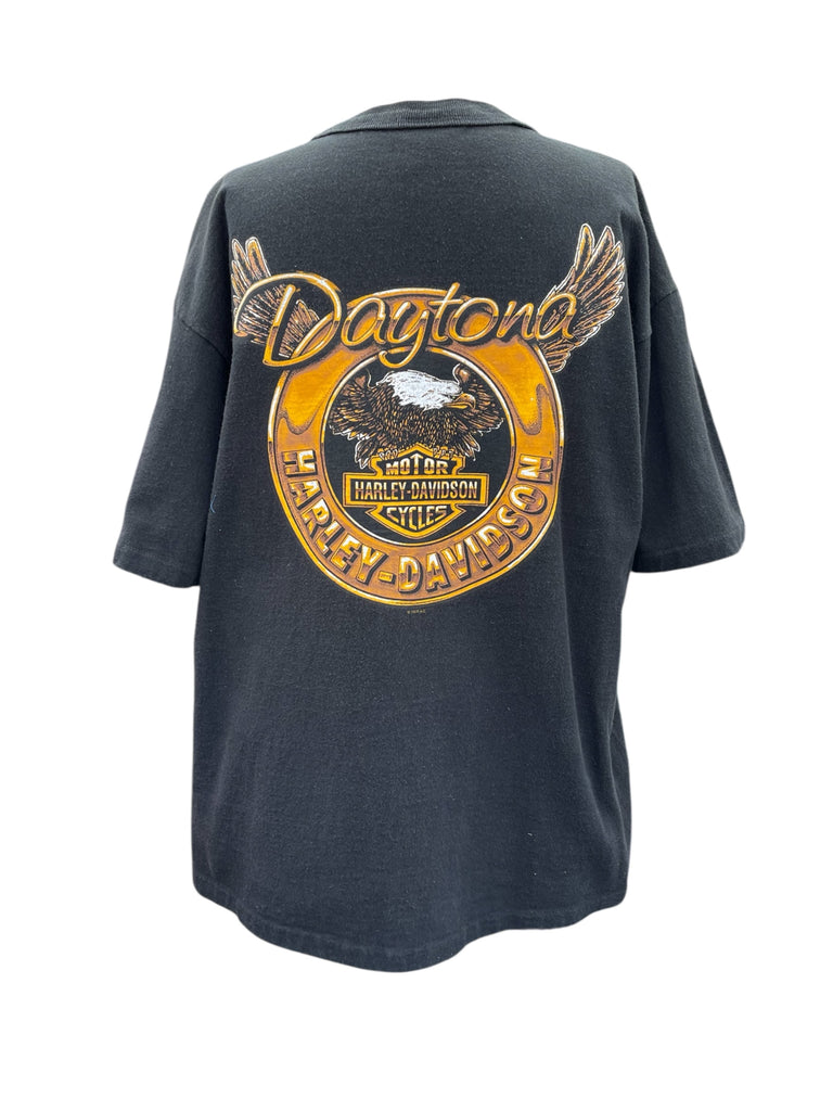 Black t-shirt with Daytona Harley-Davidson logo on the back against a white background