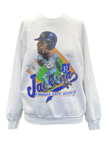 White sweatshirt with a baseball player graphic and 'Kansas City Royals' text on a white background