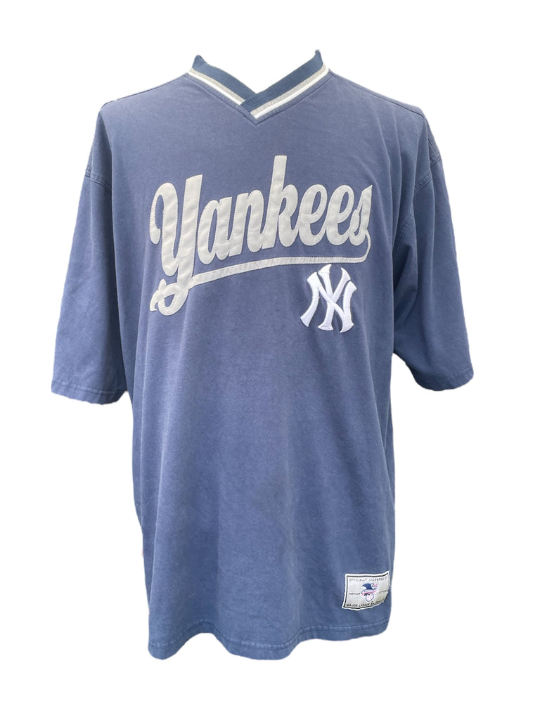 Blue baseball jersey with 'Yankees' text and logo on a white background