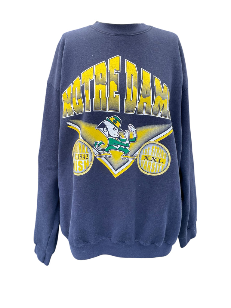 Blue sweatshirt with Notre Dame logo on a white background