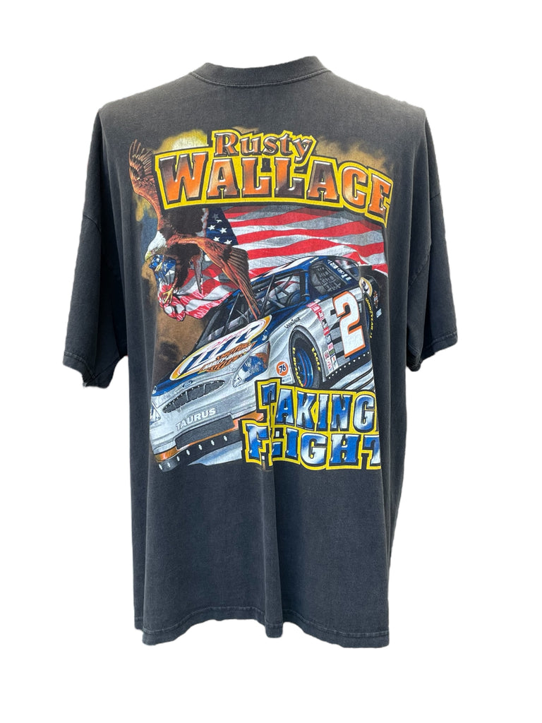 Black t-shirt with a graphic of a race car and text on a white background
