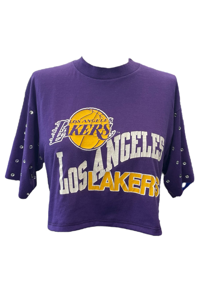Purple Los Angeles Lakers t-shirt with brand logo on a white background