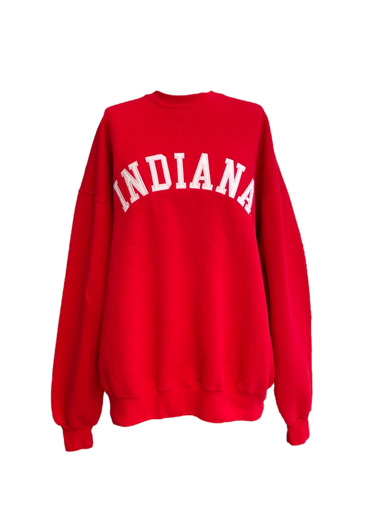 Red sweatshirt with 'INDIANA' printed on the back against a white background