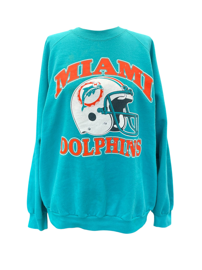 Teal sweatshirt with Miami Dolphins logo on a white background