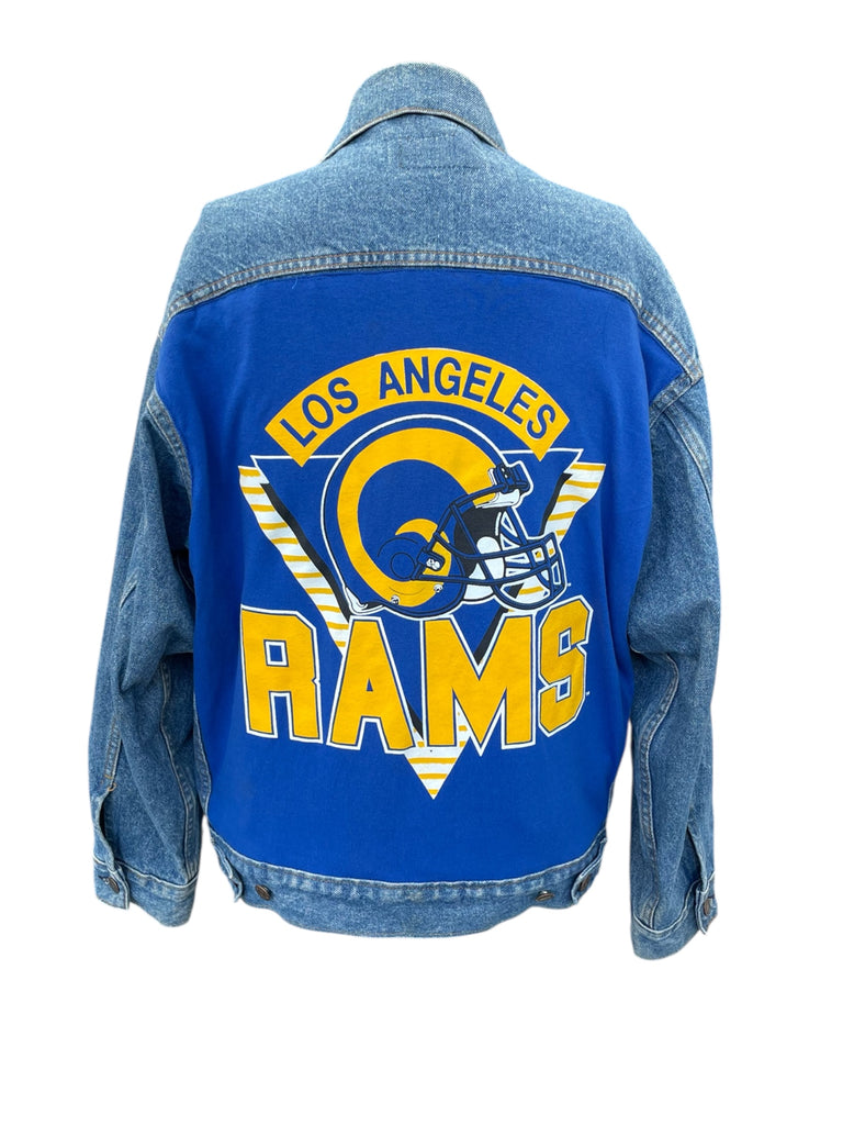 Blue denim jacket with Los Angeles Rams logo on a white background