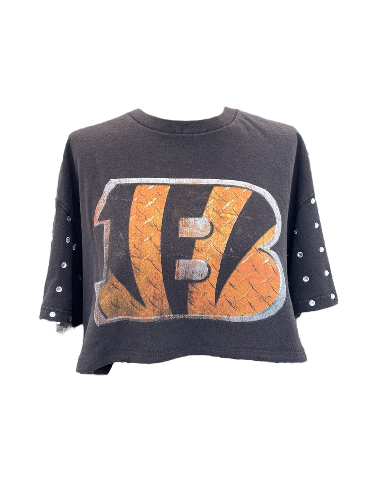Black sweatshirt with orange and white tiger stripe design on a white background