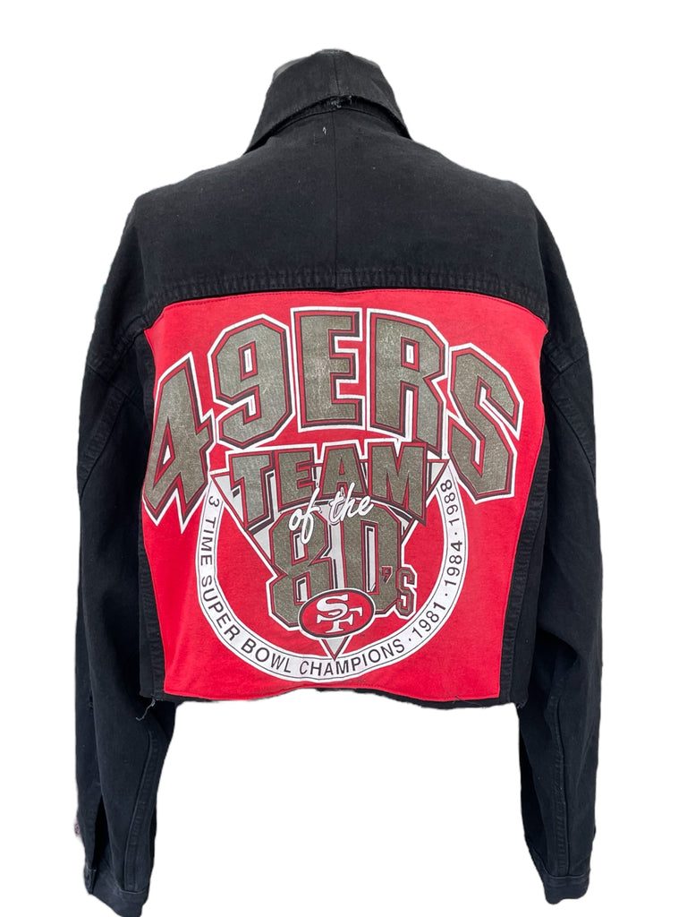 Black and red jacket with '49ers Team of the Year' text on a white background
