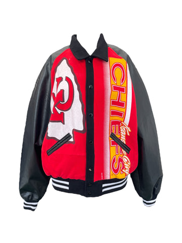 Varsity jacket with black leather sleeves and red front panel featuring a logo and text.