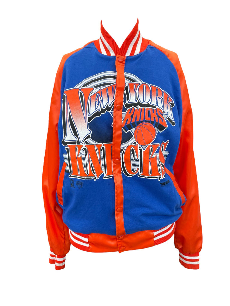 New York Knicks jacket with blue and orange colors on a white background