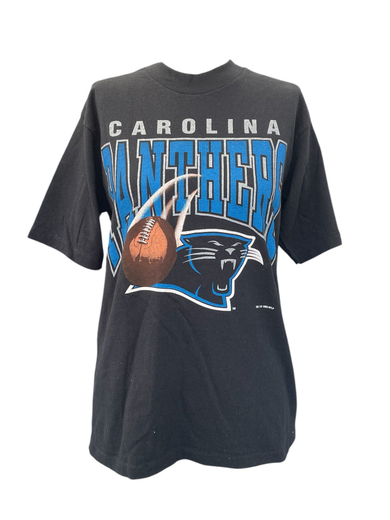 Black t-shirt with Carolina Panthers logo on a white background