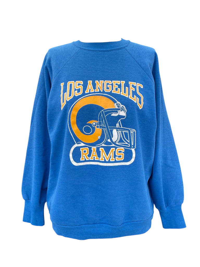 Blue sweatshirt with Los Angeles Rams logo on a white background