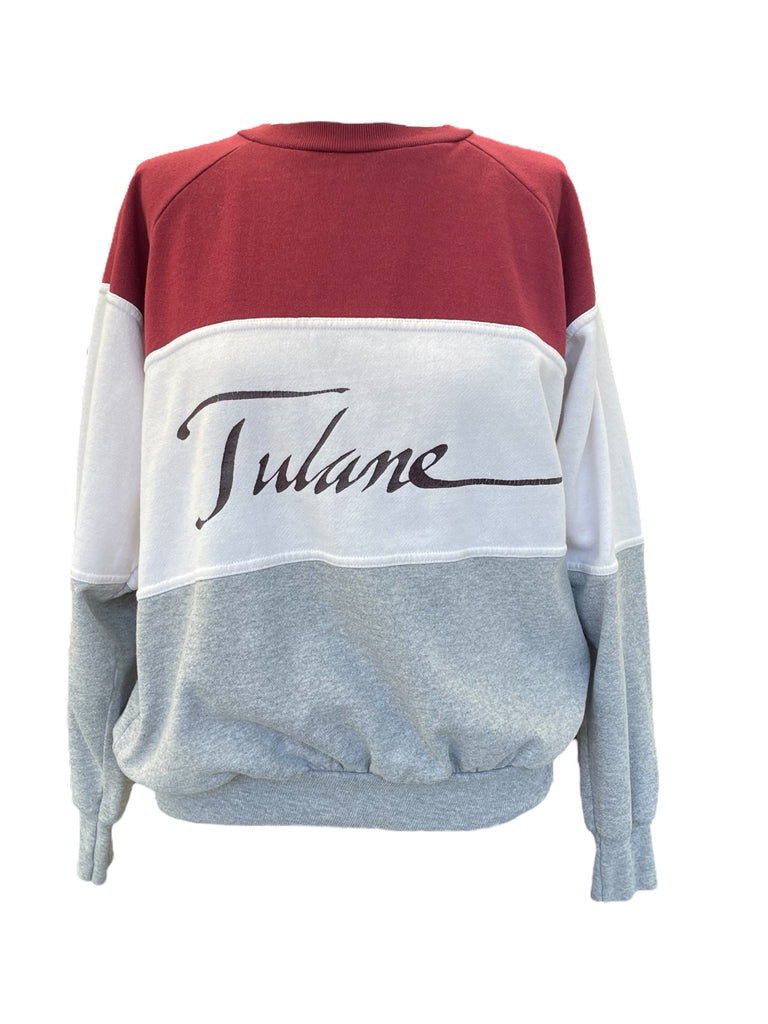 Sweatshirt with red, white, and gray color block design on a white background