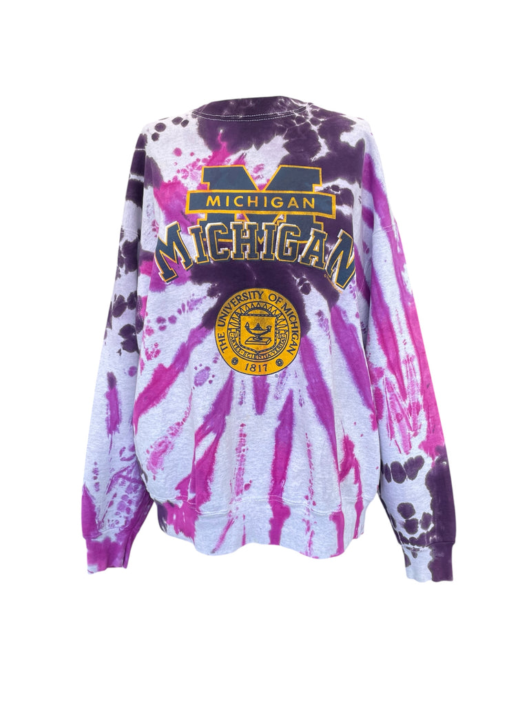 Tie-dye sweatshirt with 'Michigan' text and logo on a white background