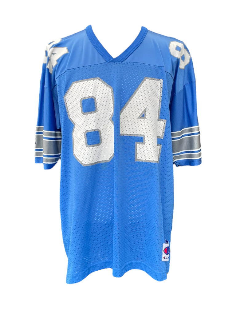 Blue sports jersey with number 84 on a white background
