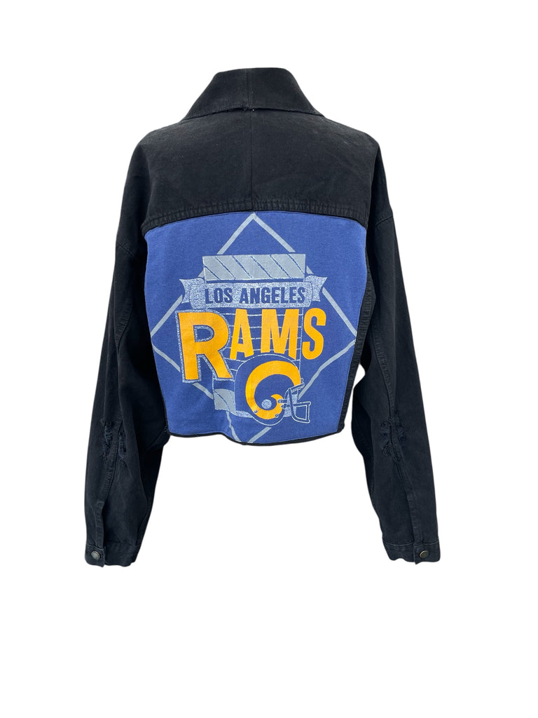 Black jacket with Los Angeles Rams logo on the back against a white background