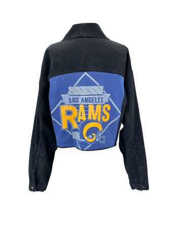 Black jacket with Los Angeles Rams logo on the back against a white background