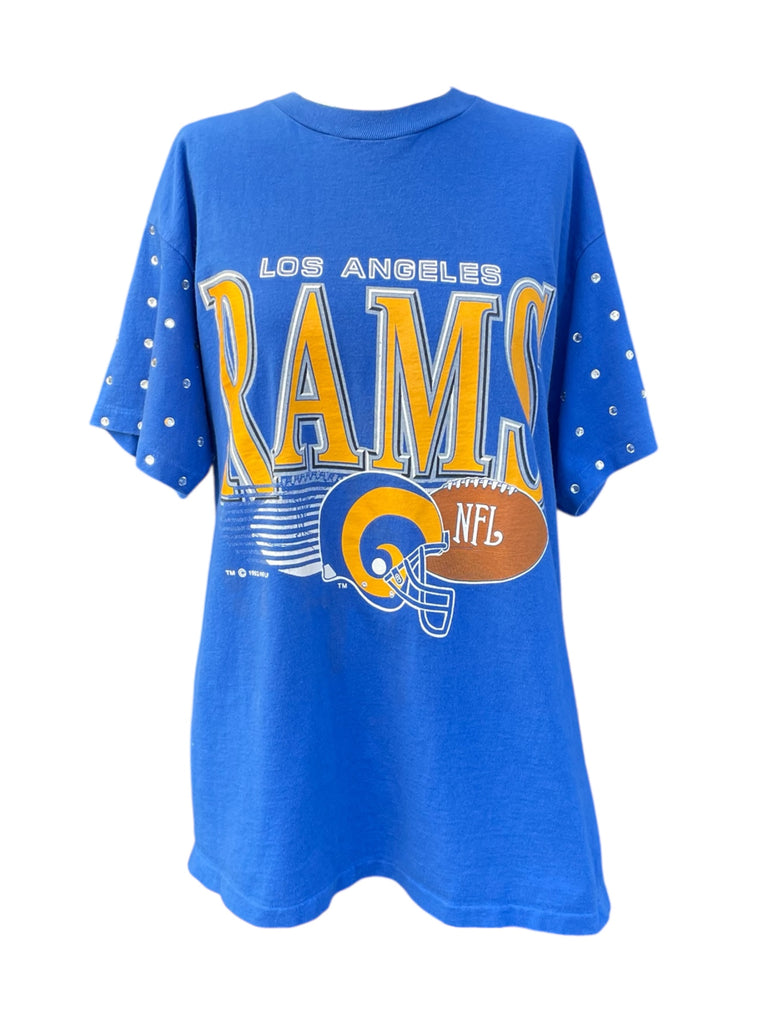 Blue Los Angeles Rams t-shirt with decorative elements on a white background