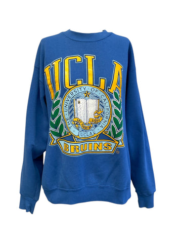 Blue sweatshirt with UCLA logo on a white background