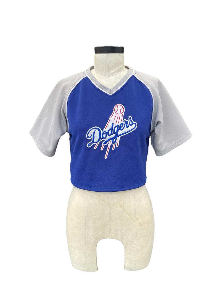 Blue and gray sports jersey with logo on a mannequin against a white background