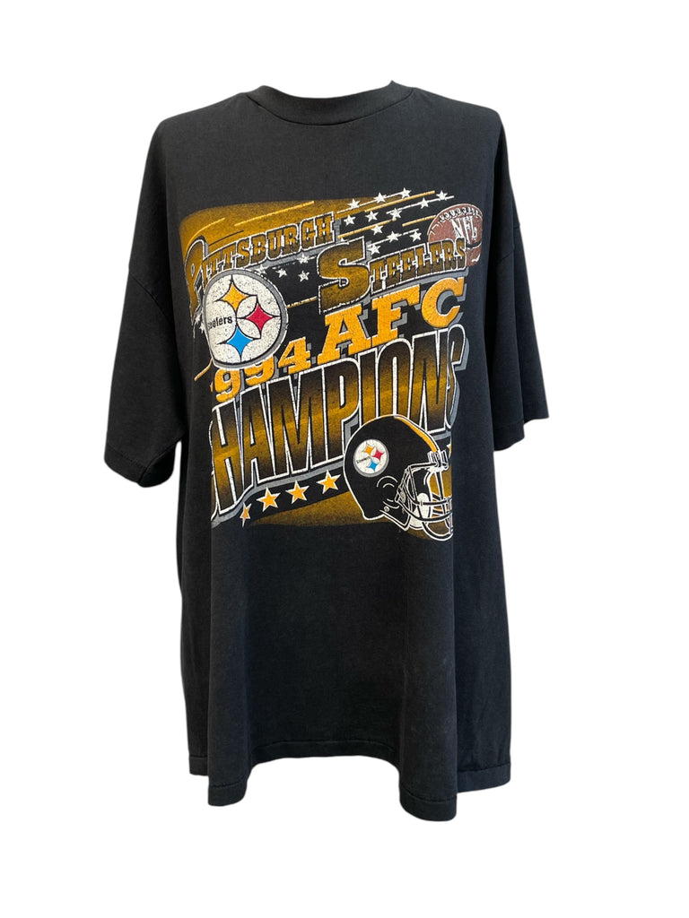 Black t-shirt with sports team graphics and text on a white background