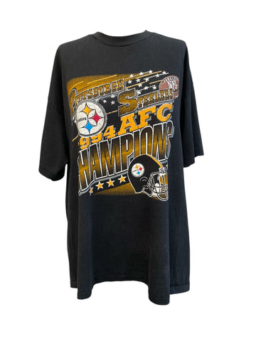 Black t-shirt with sports team graphics and text on a white background