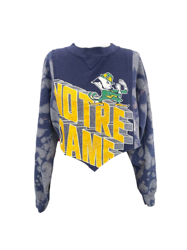 Blue and gray tie-dye hoodie with 'Notre Dame' text and logo on a white background