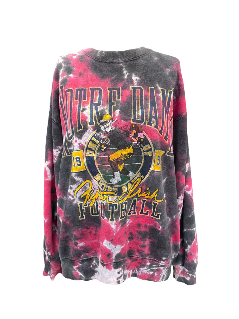 Tie-dye sweatshirt with 'Notre Dame Football' graphic on a white background