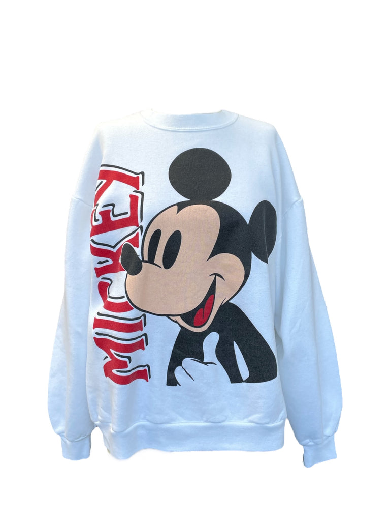 White sweatshirt with a cartoon character and red text on a white background