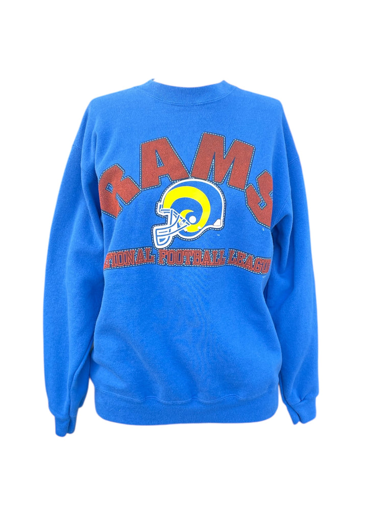 Blue sweatshirt with 'RAMS' and a helmet logo on a white background