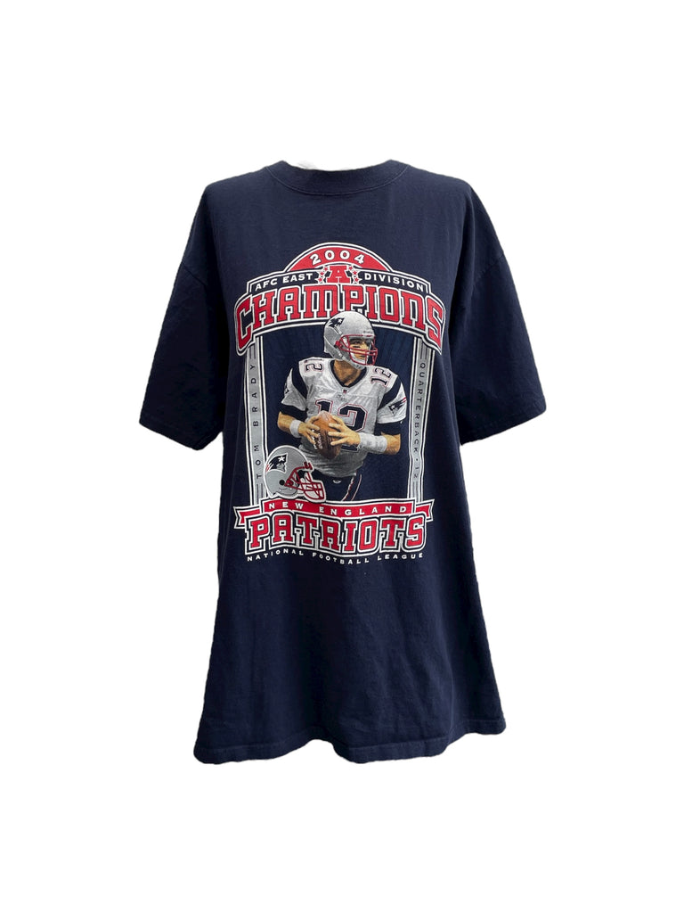 Navy blue t-shirt with a football player graphic and 'Champions' text on a white background
