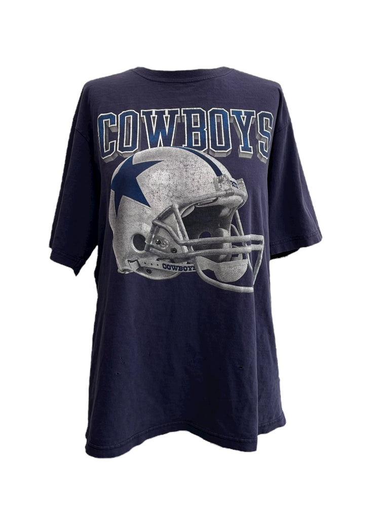 Navy blue t-shirt with a football helmet graphic and 'COWBOYS' text on a white background